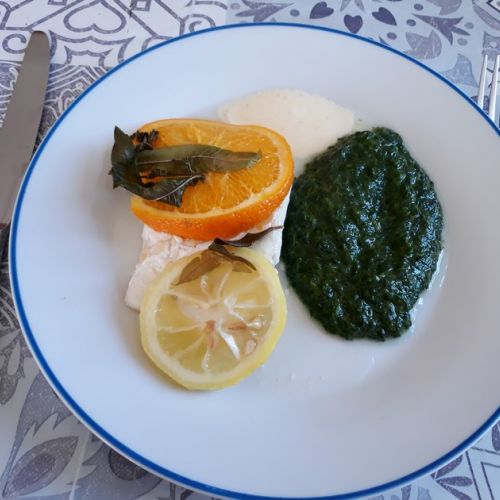 White fish papillote with citrus fruits: a tasty recipe